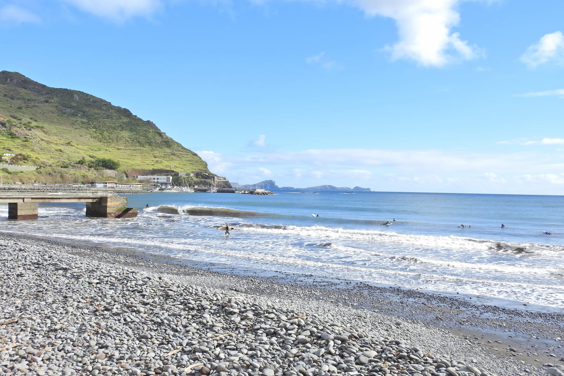 Landscape of Machico's beach in a sunny day before a kids surf lesson in madeira