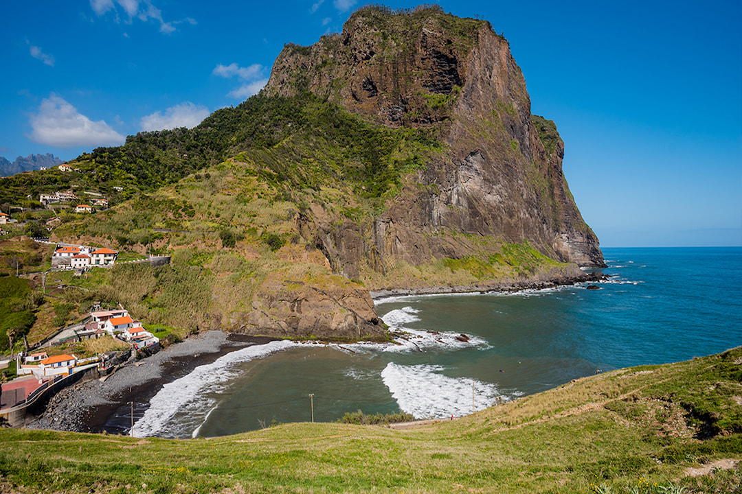 Landscape of Porto da Cruz beach in a sunny day, prepared for a kids surf lesson